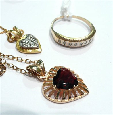 Lot 163 - A diamond half hoop ring, two pendants on chains and another chain