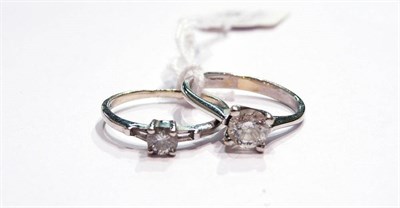 Lot 164 - An 18ct white gold diamond solitaire ring and a 9ct white gold diamond ring