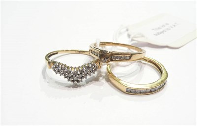 Lot 170 - An 18ct gold half hoop ring and two 9ct gold diamond set rings