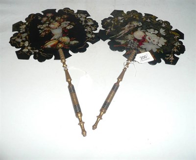 Lot 200 - A pair of papier-mache face screens