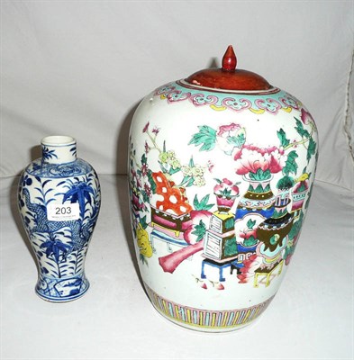 Lot 203 - A Chinese famille rose ginger jar with wooden cover and a blue and white bottle vase (2)