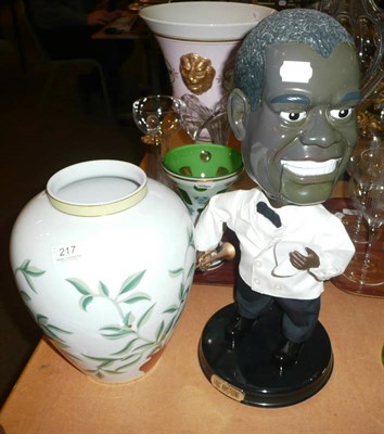 Lot 217 - Rosenthal Bulgari baluster shaped vase and a Louis Armstrong figure (2)