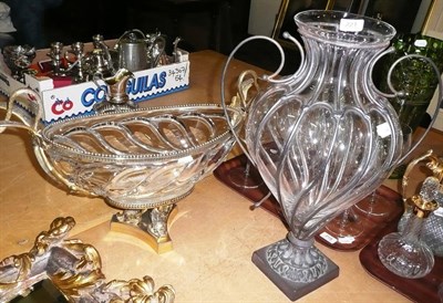 Lot 221 - Gilt metal mounted glass table centrepiece and a glass urn shaped vase with metal mounts (2)