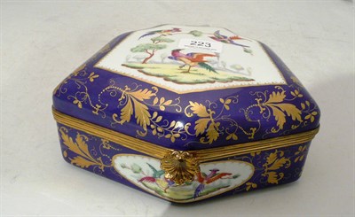 Lot 223 - French porcelain blue ground decorated hinged box and cover