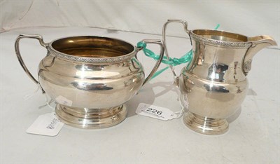 Lot 226 - Silver milk jug and sugar bowl approx. 15ozs