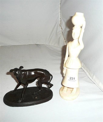 Lot 231 - Goanese ivory figure of a lady with a pot on her head circa 1920 and a spelter greyhound