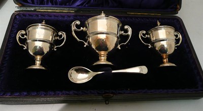 Lot 239 - A three piece condiment set 'Trophies' (3)