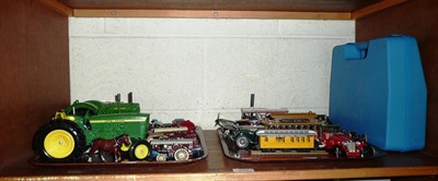 Lot 250 - A shelf of toy cars, board games, warming pan, etc