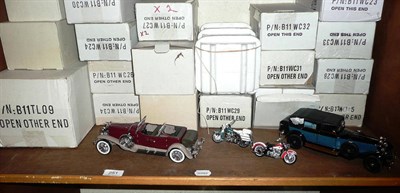 Lot 251 - A shelf of model toy cars and motorbikes