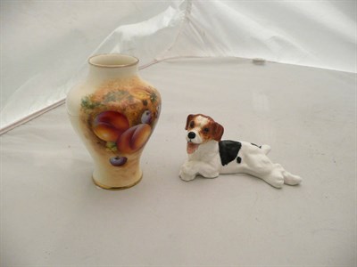 Lot 256 - Fruit painted Worcester vase and a Doulton terrier