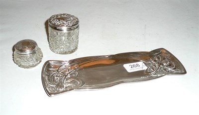 Lot 268 - Arts & Crafts silver dressing table tray and two silver-topped jars