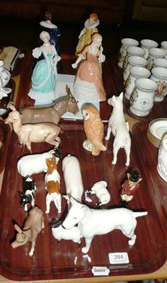 Lot 284 - Two trays including Beswick animals and four ceramic figures