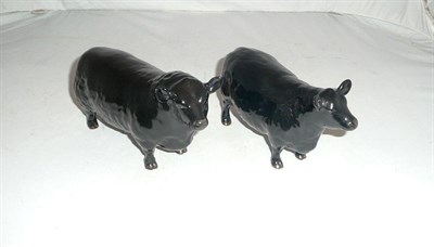 Lot 285 - A Beswick Aberdeen Angus bull and cow