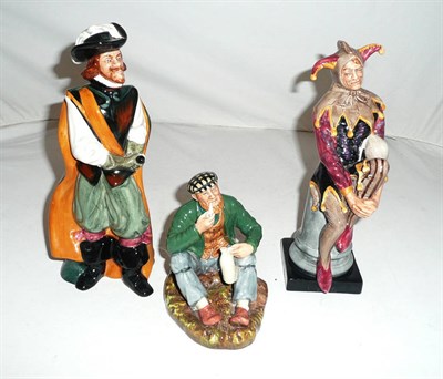 Lot 291 - Three Royal Doulton ceramic figures 'The Jester', 'The Wayfarer' and 'Cavalier' (3)