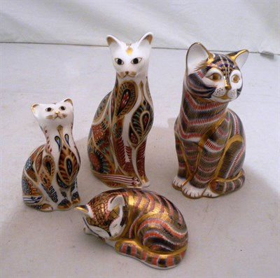 Lot 299 - Four Royal Crown Derby cat paperweights, all with gold stoppers (4)