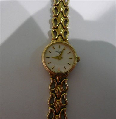 Lot 305 - Ladies gold wristwatch, box and two spare links