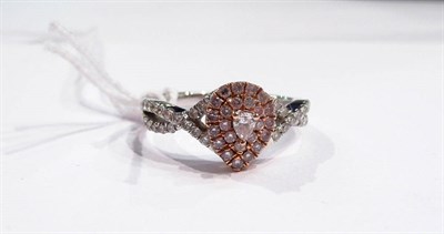 Lot 321 - An 18ct white gold pink and white diamond cluster ring