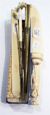 Lot 327 - An ivory comb, pickle fork, Turkish dagger and two letter openers