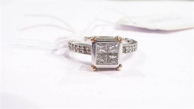 Lot 362 - A princess cut diamond cluster ring with diamond set shoulders