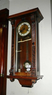 Lot 400 - A walnut Vienna-style wall clock