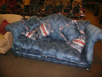 Lot 447 - Blue and floral two seater settee and cushions