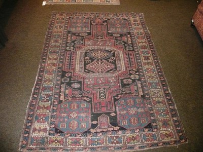 Lot 451 - Eastern red ground patterned rug and a runner (2)