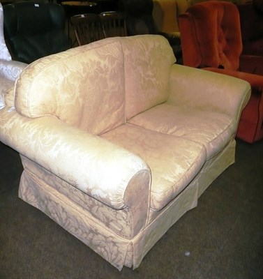 Lot 455 - Yellow two seater settee with loose covers