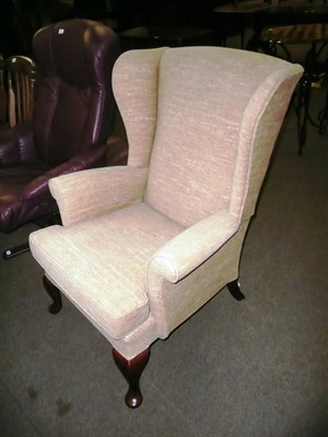 Lot 458 - Parker Knoll wing-back chair