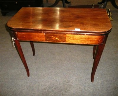 Lot 460 - Late George III mahogany fold over tea table