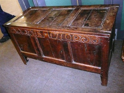 Lot 479 - An 18th century joined oak box with carved frieze, dated 1710 and initialled 'IB'