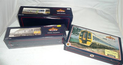 Lot 1056 - Three Boxed Bachmann Branch-Line 'OO' Gauge Multi Train Packs - 158 'Wypte Metro' 2-Car Set 31-502