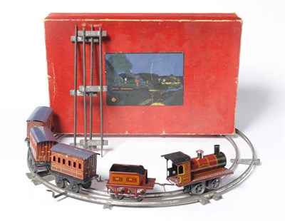 Lot 1090 - A Boxed Bing 'O' Gauge Clockwork Tinplate Passenger Train Set, lithographed in MR maroon...