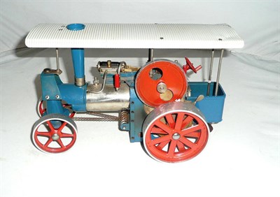 Lot 1116 - A Wilesco Live Steam Traction Engine 'Old Smoky', with blue tinplate body, red flywheel and...