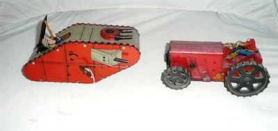 Lot 1125 - A German Clockwork Tinplate World War One Tank, lithographed in red and grey, with pop-up...