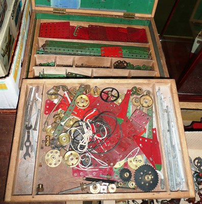 Lot 1130 - Mixed Meccano, mainly red and green, also clockwork motor, manuals etc., in a wooden box