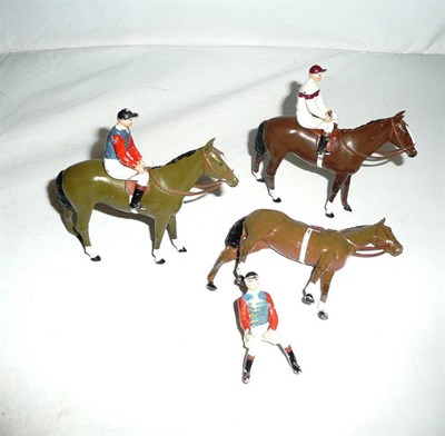 Lot 1146 - Three Britains Hollowcast Lead 'Racing Colours' Horse and Jockey Figures, comprising three bay...