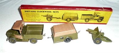 Lot 1150 - A Boxed Britains Clockwork Military Set No.2048, comprising Beetle lorry with driver, clockwork...