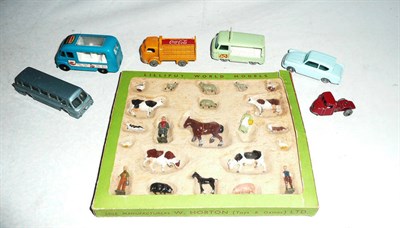 Lot 1155 - A Boxed Britains Lilliput World Farm Models Set, containing eighteen miniature animals, farmer,...