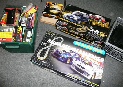 Lot 1170 - A Collection of Boxed Scalextric Cars and Accessories, including 'The Italian Job' and 'Subaru...