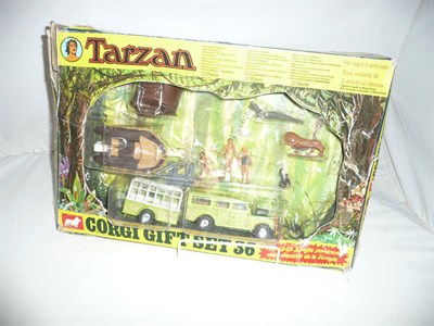 Lot 1231 - A Boxed Corgi Tarzan Gift Set No.36, containing a Land Rover and trailer, dinghy, Tarzan, Jane,...