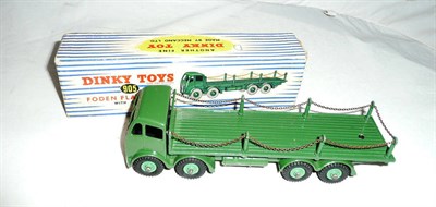 Lot 1239 - A Boxed Dinky Foden Flat Truck with Chains No.905, 2nd cab type with spare wheel and large hook, in