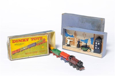 Lot 1247 - A Boxed Dinky Pre-War Mixed Goods Train Gift Set No.19, with maroon and black locomotive, green and