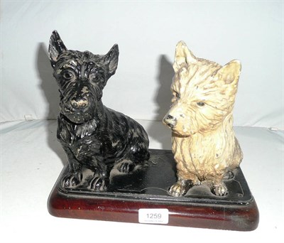 Lot 1259 - A Buchanan's Black & White Whisky Advertising Figure Group of a Scottish Terrier and a Highland...