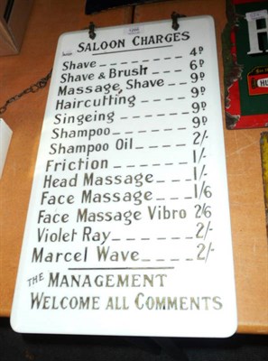 Lot 1266 - A Barbers Shop 'Saloon Charges' Price List from Blackpool Tower Barber's Shop, in milk glass...