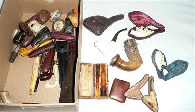 Lot 1287 - A Collection of Smokers Pipes and Cheroot Holders, including carved meerschaums and briars, many in