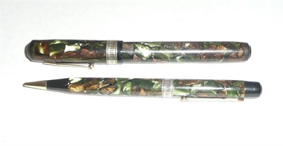 Lot 1288 - A Waterman's 'Patrician' Fountain Pen and Propelling Pencil Set, with moss agate style bodies,...