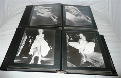 Lot 1308 - Two Albums Containing Approximately One Hundred Photographs of Marilyn Monroe, all black and white