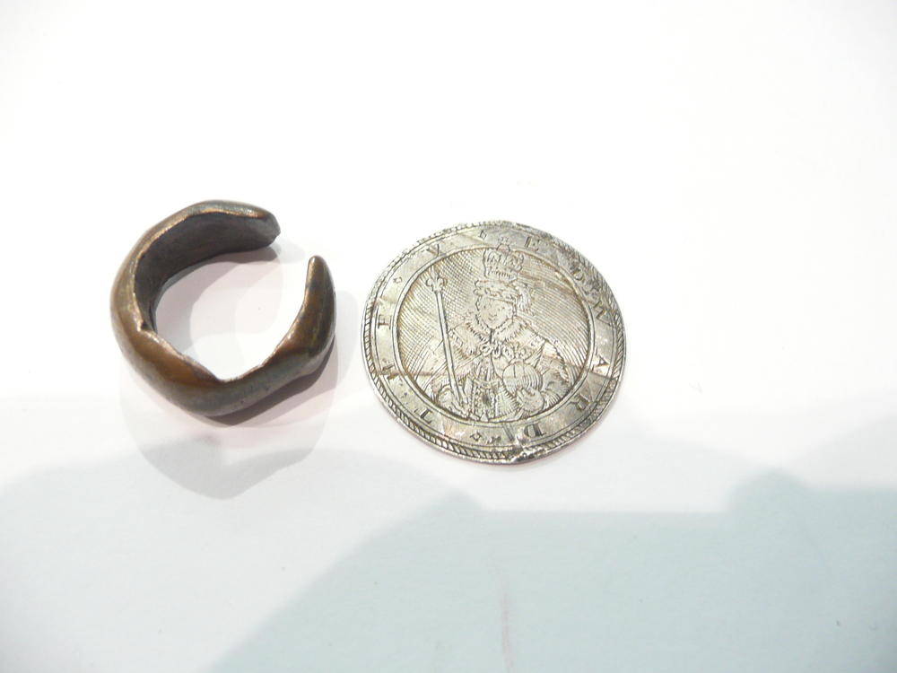 Lot 357 - A Charles I silver counter by Simon De Passe with a portrait of Edward V and a Roman ring