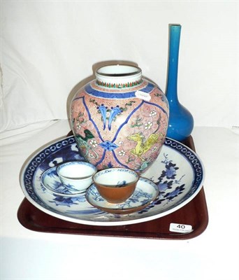 Lot 40 - Blue and white pottery charger, ginger jar, two Nanking Cargo cups and saucers and a blue glaze...