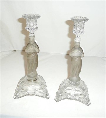 Lot 41 - Pair of Val St Lambert figural press-moulded glass candlesticks